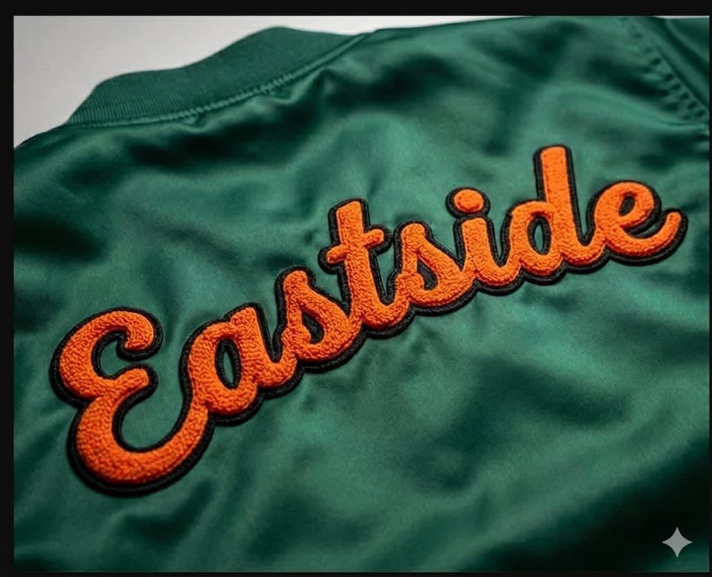 Direct chenille script on satin right chest